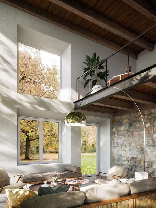 Soggiorno_luminoso_con_parete_in_pietra_e_vista_sul_giardino